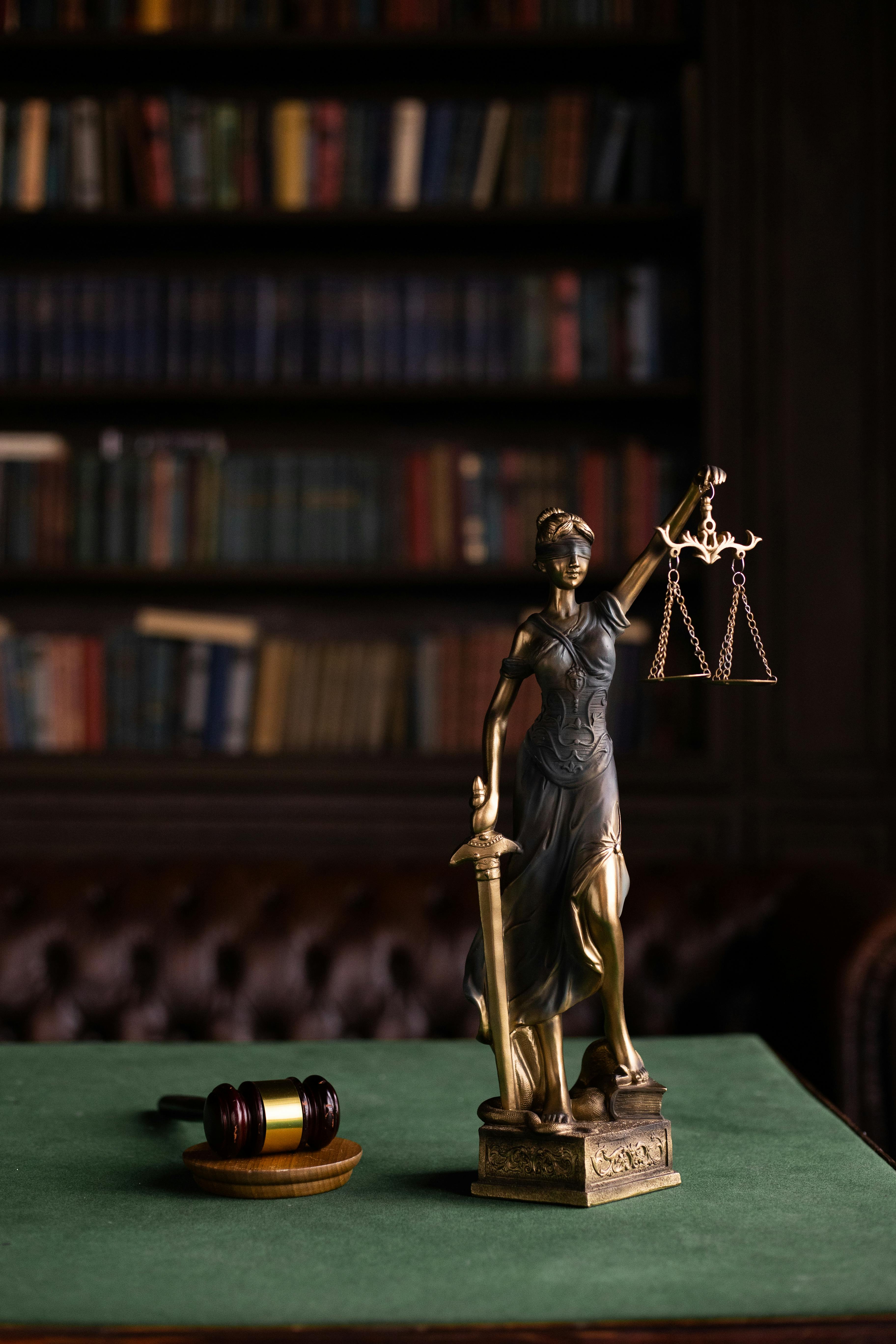 Statue of Lady Justice in a law library